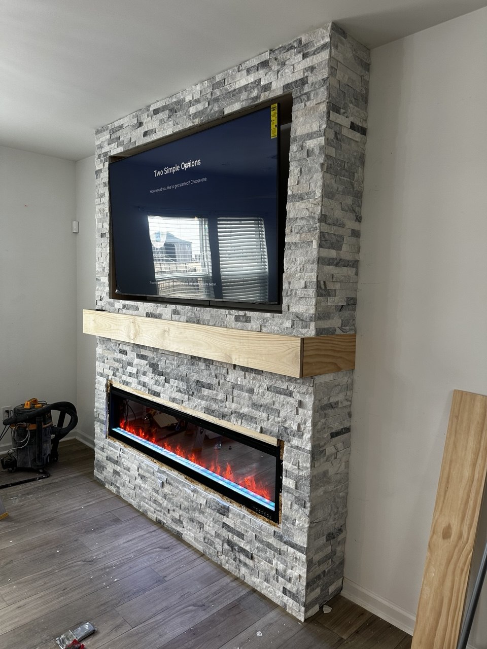 Custom fireplace feature wall completed by Simple Renovations